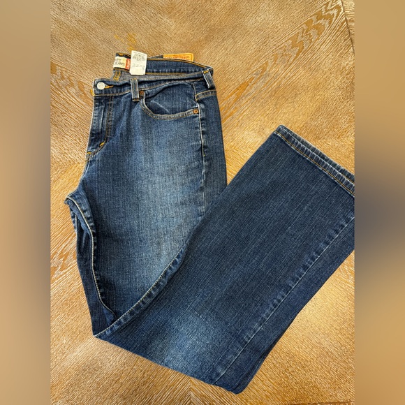 Levi's 515 Boot Cut Jeans Size 12 Stretch Mid Rise Dark Wash. waist 35” - Picture 1 of 7